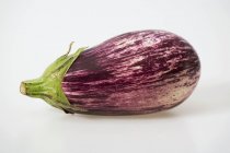 Fresh striped aubergine — Stock Photo