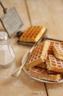 Homemade waffles with icing sugar — Stock Photo