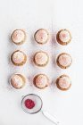 Raspberry and almond muffins — Stock Photo