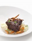 Beef steak with carrots — Stock Photo