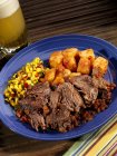 Roast beef with potatoes — Stock Photo