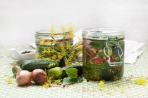 Jars of homemade pickled gherkins — Stock Photo