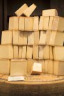 Stack of Gruyere cheese — Stock Photo