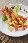 Whole king prawns with chili peppers — Stock Photo