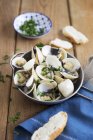 Clams in white wine — Stock Photo