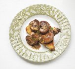 Kidneys and mushrooms on toast — Stock Photo