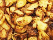 Cunhas de batata fritas — Fotografia de Stock
