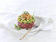 Beef tartar with avocado — Stock Photo