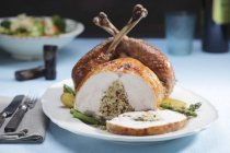 Stuffed turkey sliced at breast — Stock Photo