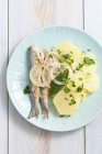 Pickled fried herring with potato salad — Stock Photo