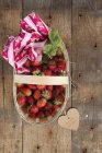 Strawberries in wooden basket — Stock Photo