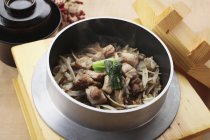 Burdock rice with chicken — Stock Photo