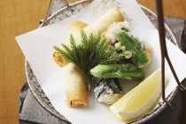 Closeup elevated view of spring rolls and Tempura — Stock Photo
