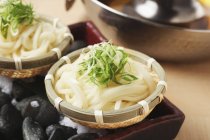 Udon noodles in bowls — Stock Photo
