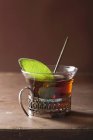 Glass of black tea with sage leaf — Stock Photo