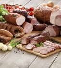 Various cold cuts with onions — Stock Photo