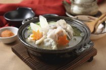Closeup view of Japanese Nabemono stew with fish — Stock Photo