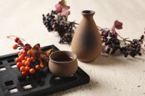 Sake rice wine in bowl — Stock Photo
