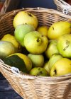 Basket of fresh quinces — Stock Photo