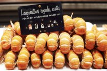Langoustines on market stall — Stock Photo