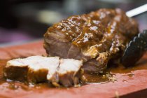 Sliced roasted pork — Stock Photo