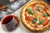 Pizza Napoli with tomatoes — Stock Photo