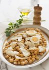 Chickpea salad with fish, eggs and oil — Stock Photo