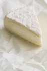 Piece of soft cheese — Stock Photo