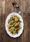 Penne pasta with green beans — Stock Photo