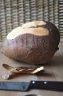 Partially peeled sweet potato — Stock Photo
