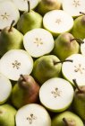 Fresh pears with halves — Stock Photo