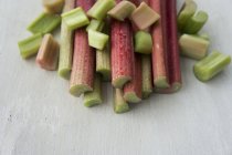 Partially sliced Rhubarb stalks — Stock Photo