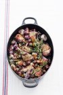 Top view of Coq au vin in braising dish — Stock Photo