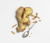 Partially peeled ginger root — Stock Photo