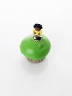 Cupcake decorated with boy figure — Stock Photo