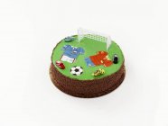 Gâteau décoré de motifs de football — Photo de stock