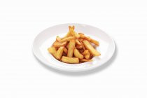 Pommes de terre frites sur assiette — Photo de stock