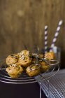 Muffins with salt and sesame seeds — Stock Photo