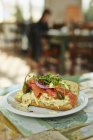 Baguette sandwich with salad — Stock Photo