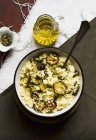 Couscous with courgettes and pumpkin seeds — Stock Photo