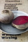 Fresh whole and halved Beetroot — Stock Photo