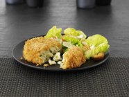Breaded cheese and cakes — Stock Photo