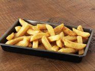 Tray of potato fries — Stock Photo
