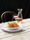Linguine pasta with chilli prawns — Stock Photo