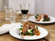 Roasted Duck with red wine — Stock Photo