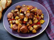 Fried potatoes with sausage — Stock Photo