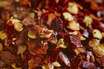 Nahaufnahme von roten trockenen Chiliflocken — Stockfoto