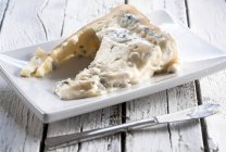 Wedge of Gorgonzola cheese — Stock Photo