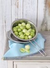 Brussels sprouts in colander — Stock Photo