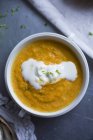 Carrot and ginger soup with cream — Stock Photo